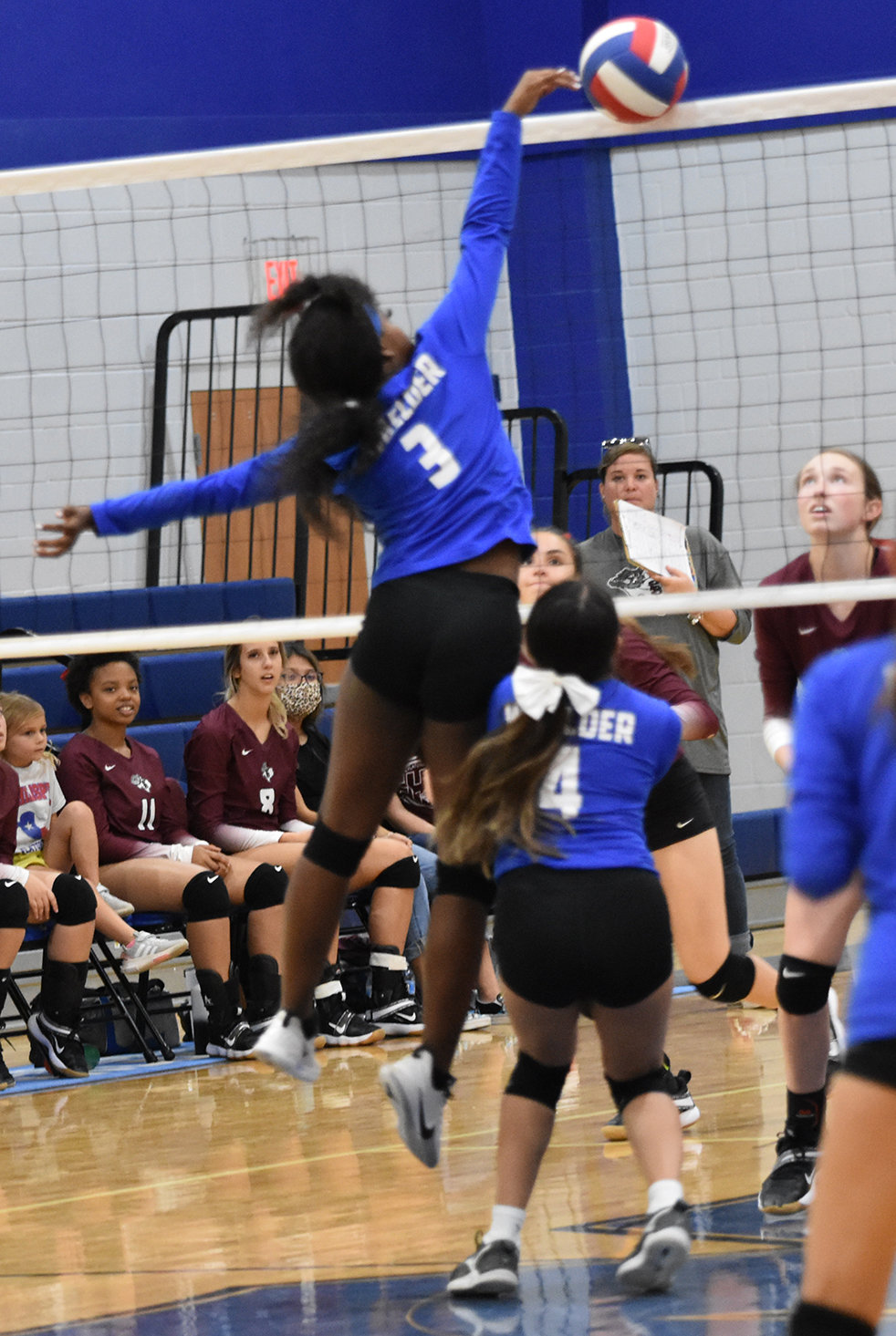 The Waelder High School volleyball team closed out the regular season with losses to Flatonia on Friday, Oct. 22 and Shiner on Tuesday, Oct. 26. Jahlissia Thompson attempts to tip the ball over the net against Flatonia. The Wildcats will head to the 1A playoffs against Runge.